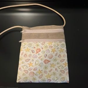 Crossbody bag with 2 zippers and adjustable strap